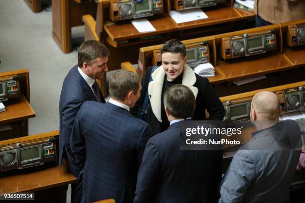 Ukrainian parliamentary deputy Nadiya Savchenko talks to her collegues during a parliament session in Kyiv, Ukraine March 22, 2018.