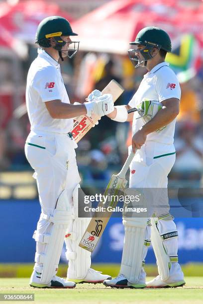 De Villiers celebrate with Dean Elgar of South Africa after scoring 50 runs during day 1 of the 3rd Sunfoil Test match between South Africa and...