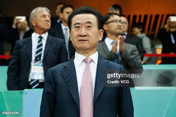 Wang Jianlin, Chairman and President of Dalian Wanda Group Co., watches from the stand during the 2018 China Cup International Football Championship...