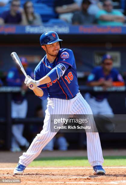 Travis d'Arnaud of the New York Mets in action during a spring training game against the Houston Astros at First Data Field on March 6, 2018 in Port...