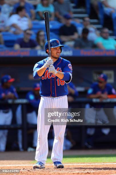 Travis d'Arnaud of the New York Mets in action during a spring training game against the Houston Astros at First Data Field on March 6, 2018 in Port...