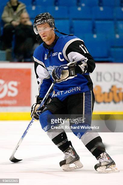 Mike Thomas of the Saint John Sea Dogs skates during the warm up period prior to facing the Drummondville Voltigeurs at the Marcel Dionne Centre on...