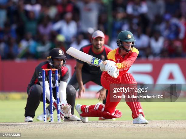 Sean Williams of Zimbabwe scores runs during The ICC Cricket World Cup Qualifier between the UAE and Zimbabwe at The Harare Sports Club on March 22,...