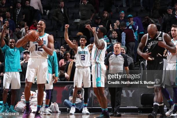 Jeremy Lamb and the Charlotte Hornets celebrate after the game against the Brooklyn Nets on March 21, 2018 at Barclays Center in Brooklyn, New York....
