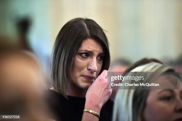 Linda Dillon of Sinn Fein cries as the unveiling of the official Assembly portrait of former Deputy First Minister Martin McGuinness takes place...