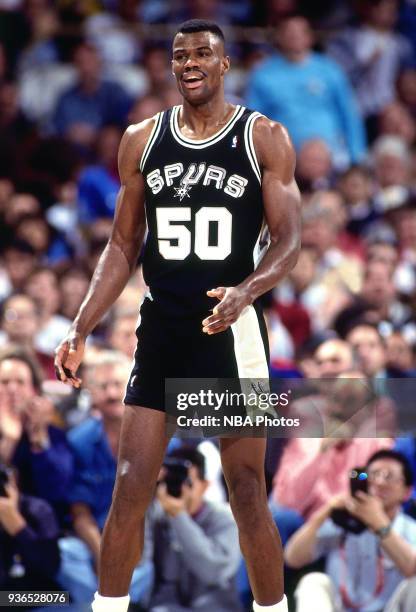 David Robinson of the San Antonio Spurs looks on circa 1994 at the Oakland Coliseum in Oakland, California. NOTE TO USER: User expressly acknowledges...