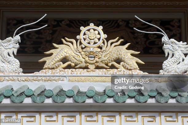 Chua Phat Bao buddhist temple. Dharma wheel and dragons. Ho chi Minh City. Vietnam.