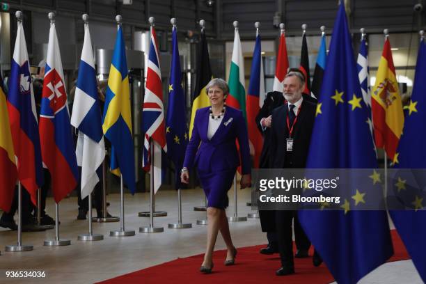 Theresa May, U.K. Prime minister, left, and Tim Barrow, U.K. Permanent representative to the European Union , arrive for a summit of European Union...