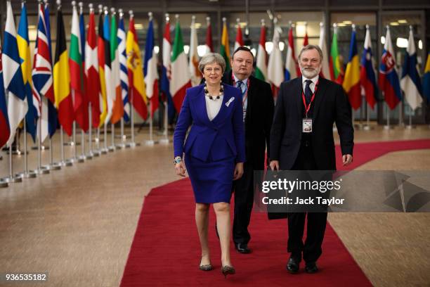 British Prime Minister Theresa May arrives at the Council of the European Union for the first day of the European Council leaders' summit on March...