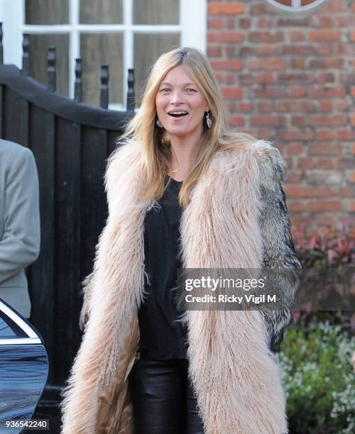 Kate Moss leaves her house with husband Jamie Hince on her birthday on January 16, 2015 in London, England.