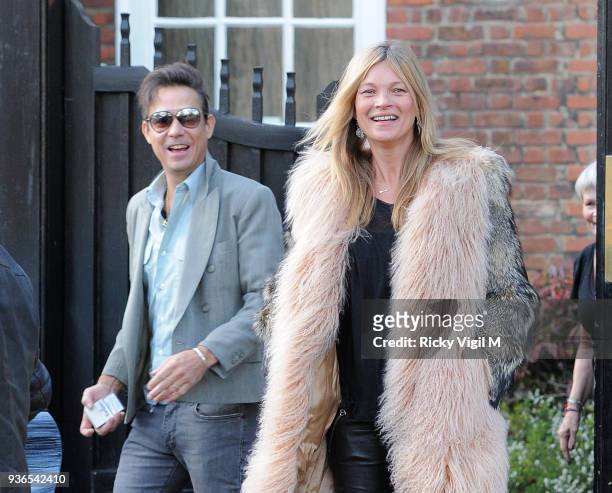 Kate Moss leaves her house with husband Jamie Hince on her birthday on January 16, 2015 in London, England.