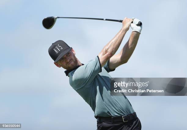 Tyler McCumber plays his shot on the first tee during round one of the Corales Puntacana Resort & Club Championship on March 26, 2018 in Punta Cana,...