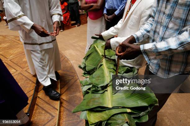 Sunday mass in Mulago catholic church. Offerings. Uganda.