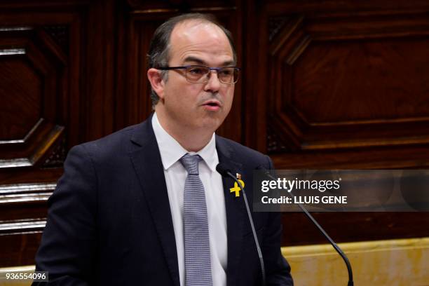 Junts per Catalonia' - JUNTSXCAT member of Catalonia's parliament Jordi Turull gives a speech during a parliament session in Barcelona to vote for...