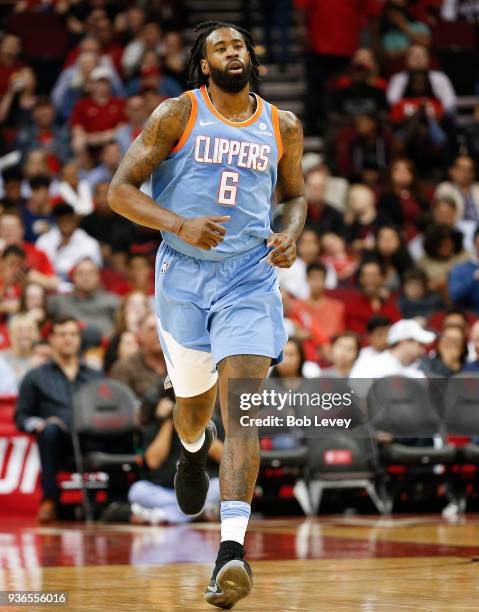 DeAndre Jordan of the LA Clippers runs up court at Toyota Center on March 15, 2018 in Houston, Texas. NOTE TO USER: User expressly acknowledges and...