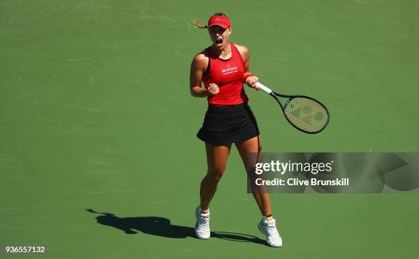 Angelique Kerber of Germany celebrates a break point against Johanna Larsson of Sweden in their second round match during the Miami Open Presented by...