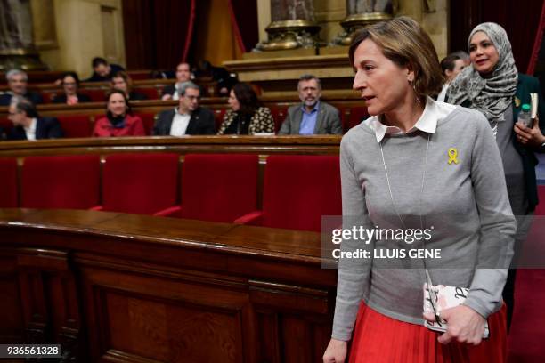 Former president of Catalonia's parliament Carme Forcadell arrives for a parliament session in Barcelona to vote for the only candidate for the...