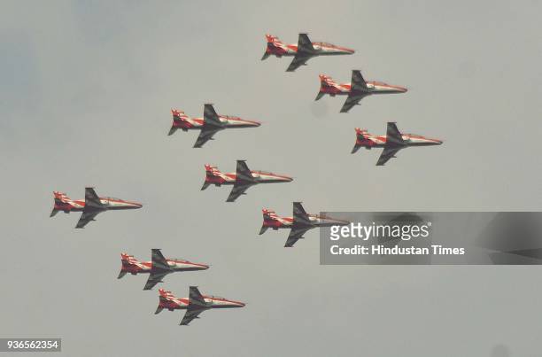 Fighter planes showing their skills during an Air Show organised at Halwara Air Force Station on March 22, 2018 in Ludhiana, India. President Ram...