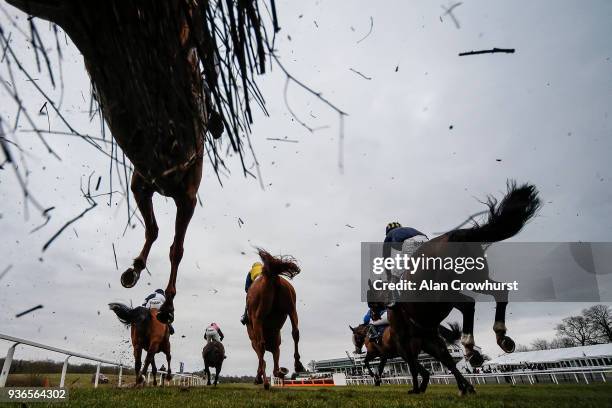 General view as runners clear the fence in front of the grandstands at Chepstow racecourse on March 22, 2018 in Chepstow, Wales.