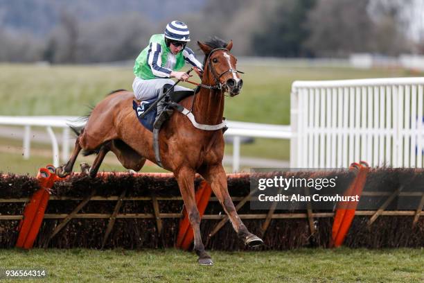 Ciaran Gethings riding Heluvagood clear the last to win The ECIC Novices' Handicap Hurdle Race at Chepstow racecourse on March 22, 2018 in Chepstow,...