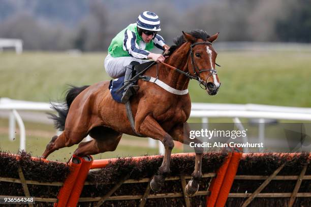 Ciaran Gethings riding Heluvagood clear the last to win The ECIC Novices' Handicap Hurdle Race at Chepstow racecourse on March 22, 2018 in Chepstow,...