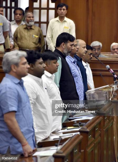 Delhi Chief Minister Arvind Kejriwal with Delhi Deputy Chief Minister and Finance Minister Manish Sisodia, Delhi Cabinet Ministers Satyendra Kumar...