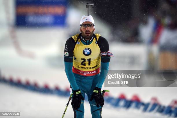 France's Martin Fourcade competes in the men's 10 km sprint event during the IBU Biathlon World Cup Final in Tyumen on March 22, 2018. France's...