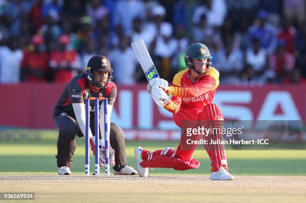 Sean Williams of Zimbabwe scores runs during The ICC Cricket World Cup Qualifier between the UAE and Zimbabwe at The Harare Sports Club on March 22,...
