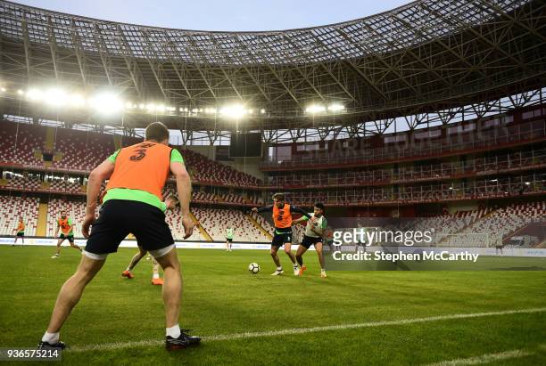 Antalya , Turkey - 22 March 2018; Jeff Hendrick is tackled by Derrick Williams during a Republic of Ireland training session at Antalya Stadium in...