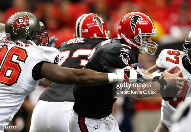 Matt Ryan of the Atlanta Falcons is sacked by Tim Crowder of the Tampa Bay Buccaneers at Georgia Dome on November 29, 2009 in Atlanta, Georgia.