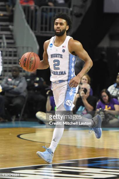 Joel Berry II of the North Carolina Tar Heels dribbles up court during the first round of the 2018 NCAA Men's Basketball Tournament against the...