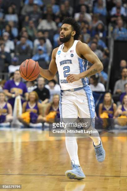 Joel Berry II of the North Carolina Tar Heels dribbles up court during the first round of the 2018 NCAA Men's Basketball Tournament against the...