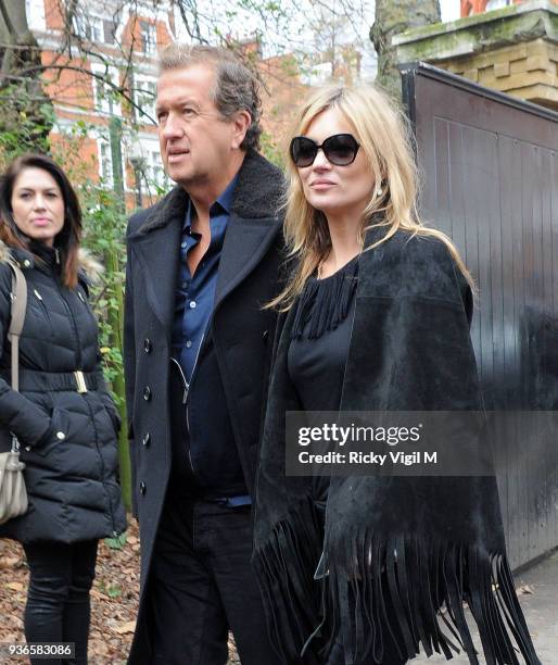 Kate Moss and Mario Testino attend the Burberry Prorsum show a/w 2015 during London Fashion Week on February 23, 2015 in London, England.