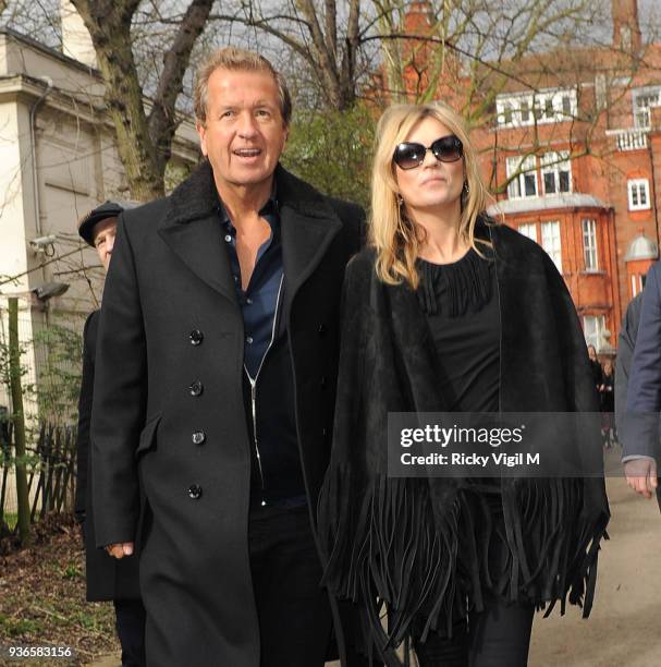 Kate Moss and Mario Testino attend the Burberry Prorsum show a/w 2015 during London Fashion Week on February 23, 2015 in London, England.