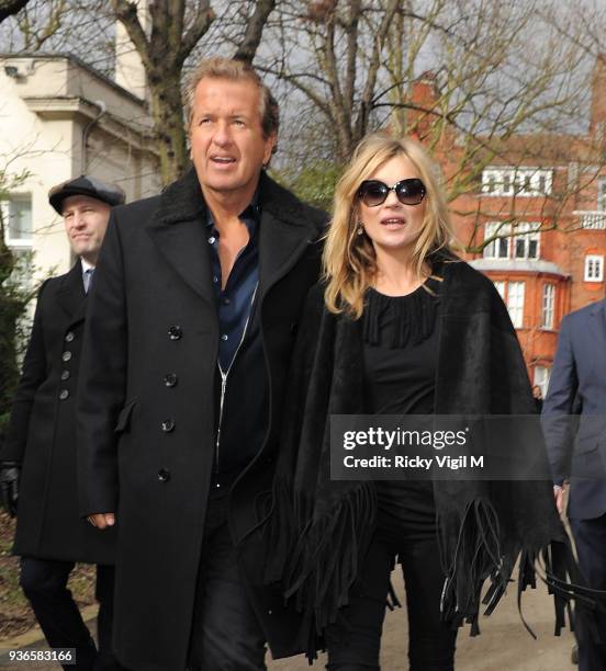 Kate Moss and Mario Testino attend the Burberry Prorsum show a/w 2015 during London Fashion Week on February 23, 2015 in London, England.