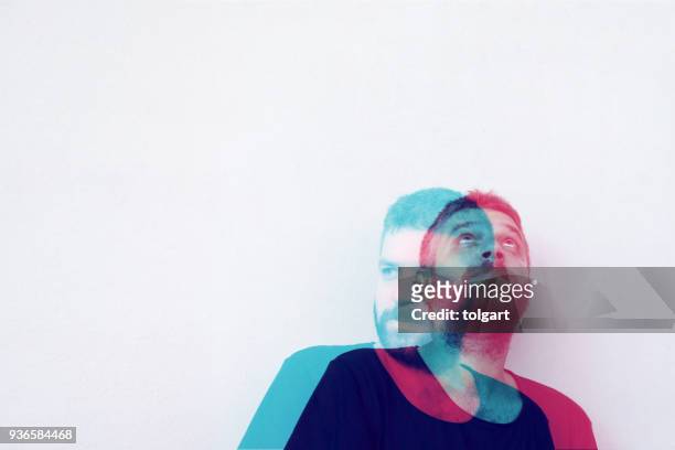 multiple image of handsome young man against - multiple exposure stock pictures, royalty-free photos & images