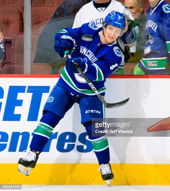 Brendan Leipsic of the Vancouver Canucks passes the puck up ice during their NHL game against the Arizona Coyotes at Rogers Arena March 7, 2018 in...