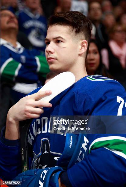 Nikolay Goldobin of the Vancouver Canucks listens to the national anthem during their NHL game against the Arizona Coyotes at Rogers Arena March 7,...