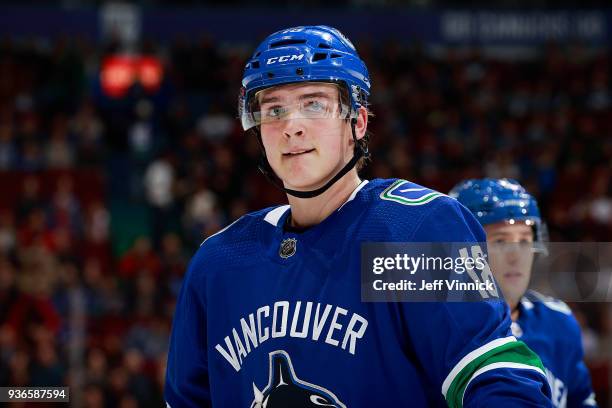 Jake Virtanen of the Vancouver Canucks looks on from the bench during their NHL game against the Arizona Coyotes at Rogers Arena March 7, 2018 in...