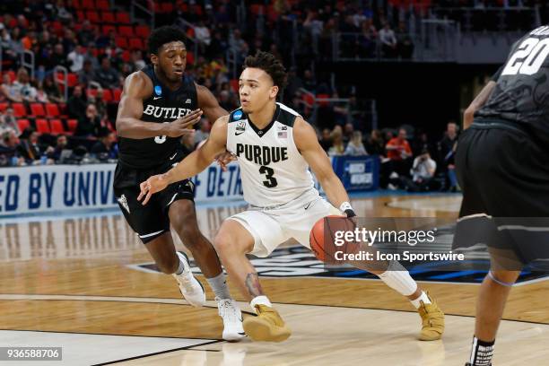 Purdue Boilermakers guard Carsen Edwards drives to the basket against Butler Bulldogs guard Kamar Baldwin during the NCAA Division I Men's...