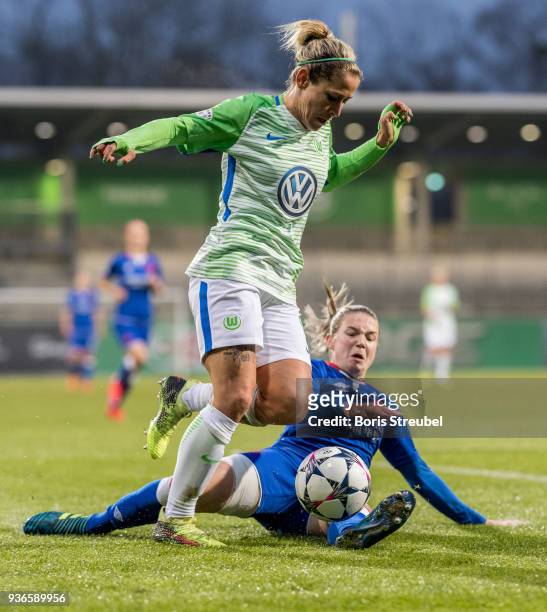 Anna Blaesse of VfL Wolfsburg is challenged by y Tereza Krejcirikova of Slavia Praha during the UEFA Women's Champions League Quarter Final first leg...