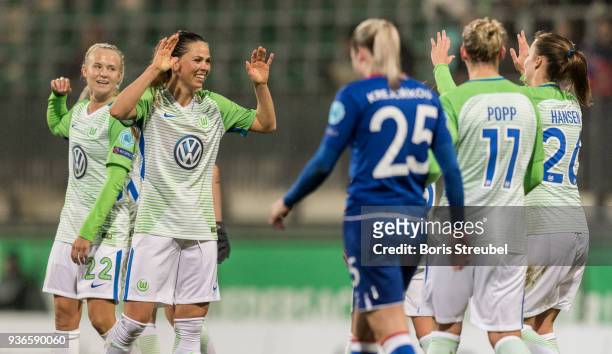 Sara Bjoerk Gunnarsdottir of VfL Wolfsburg celebrates with team mates after scoring her team's third goal during the UEFA Women's Champions League...