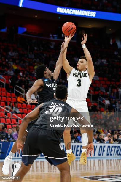 Purdue Boilermakers guard Carsen Edwards shoots a jump shot over Butler Bulldogs guard Kamar Baldwin during the NCAA Division I Men's Championship...