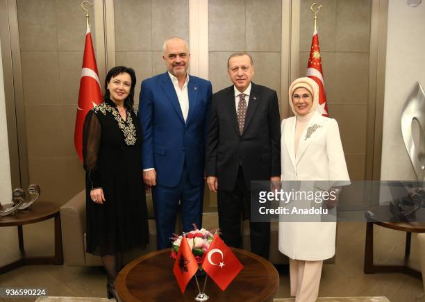 Turkish President Recep Tayyip Erdogan and his wife Emine Erdogan , Albania's Prime Minister Edi Rama and his wife Linda Rama pose for a photo during...