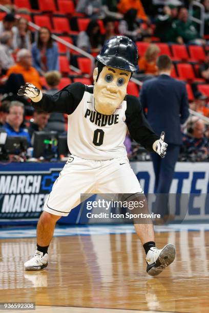 The Purdue mascot entertains during a timeout during the NCAA Division I Men's Championship Second Round basketball game between the Butler Bulldogs...