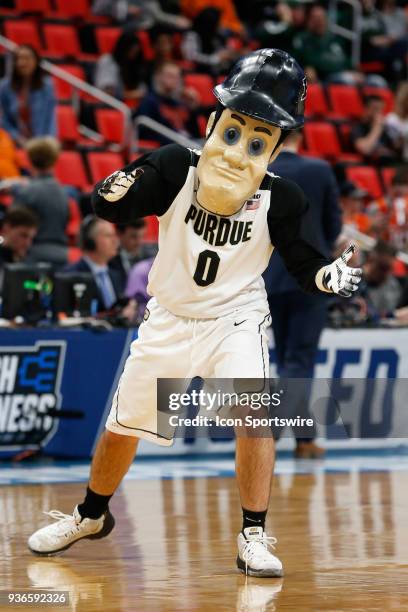 The Purdue mascot entertains during a timeout during the NCAA Division I Men's Championship Second Round basketball game between the Butler Bulldogs...