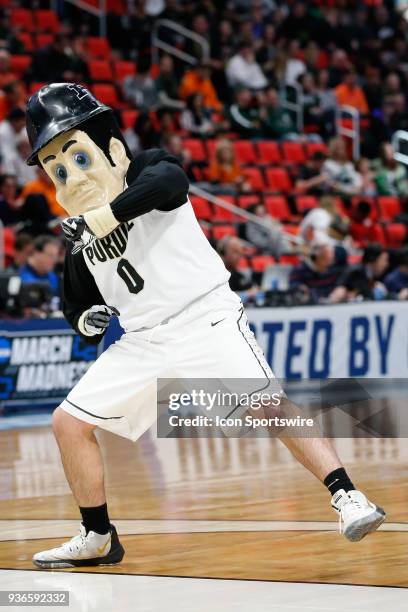 The Purdue mascot entertains during a timeout during the NCAA Division I Men's Championship Second Round basketball game between the Butler Bulldogs...