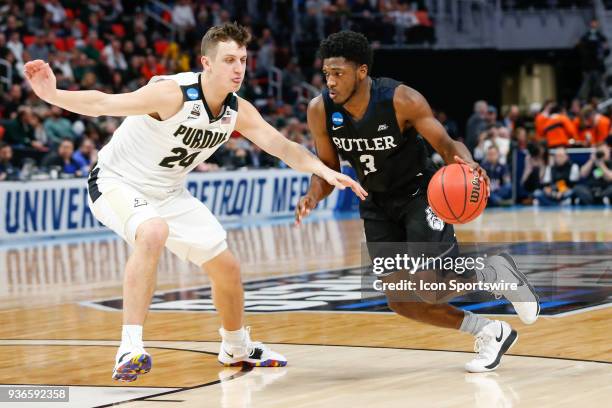 Butler Bulldogs guard Kamar Baldwin drives to the basket against Purdue Boilermakers forward Grady Eifert during the NCAA Division I Men's...