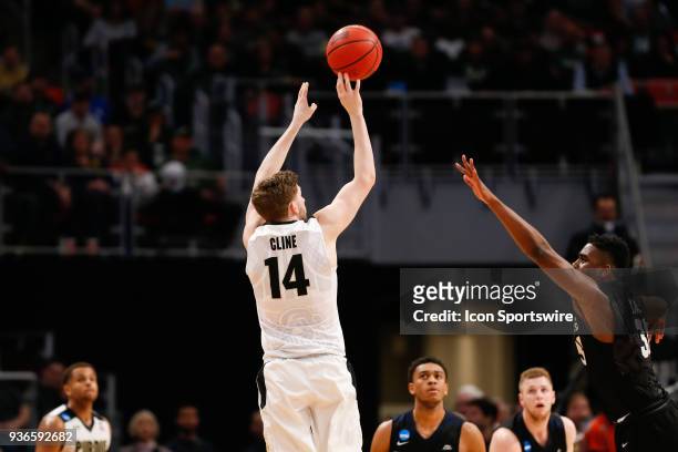 Purdue Boilermakers guard Ryan Cline shoots a jump shot during the NCAA Division I Men's Championship Second Round basketball game between the Butler...