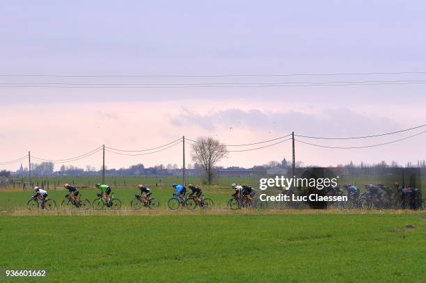 Peloton / Rain / Car / during the 1st 3 Days De Panne 2018 Women's race a 151,7km race from Brugge to De Panne on March 22, 2018 in De Panne, Belgium.